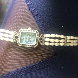 Gorgeous Lu coral pearl watch. Classic one of a kind!